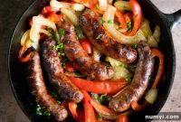 Sizzling Beer Brats with Peppers and Onions