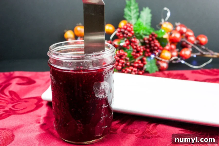 Easy Homemade Cranberry Sauce Your Way 6 Thin spatula running around the inside of a jar.
