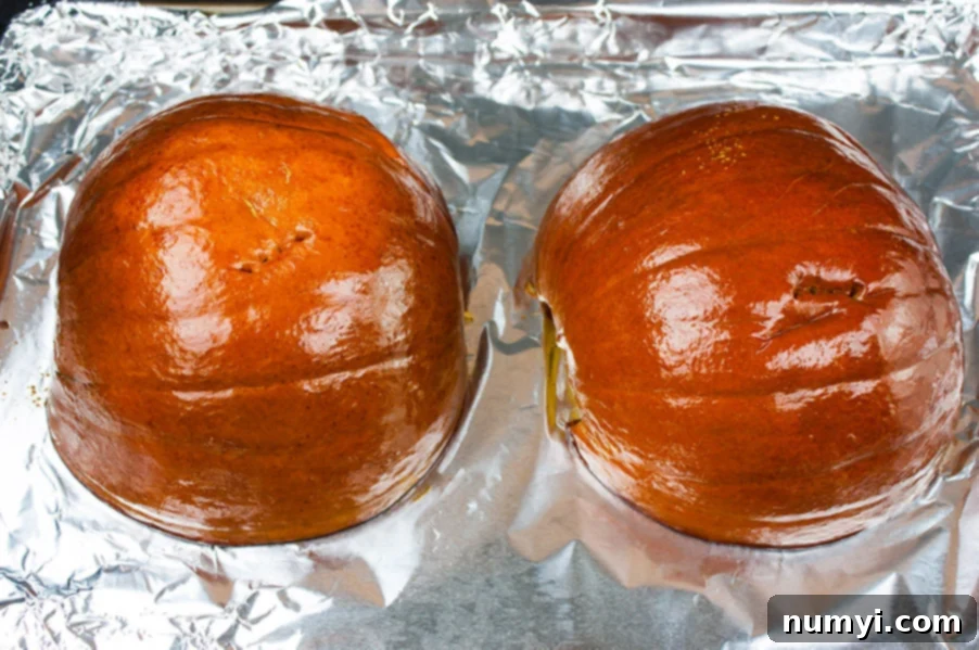 Gingersnap Crust Pumpkin Pie - pie pumpkin roasted on a foil covered sheet pan