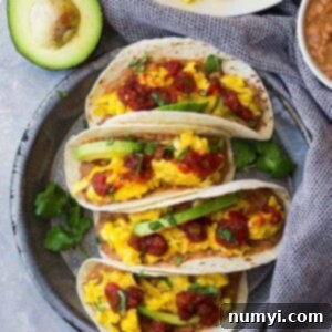 Sunrise Bean and Cheese Taco Bliss 6 These meatless Bean and Cheese Breakfast Tacos are a great way to start off the day! They are delicious, hearty, and healthy!