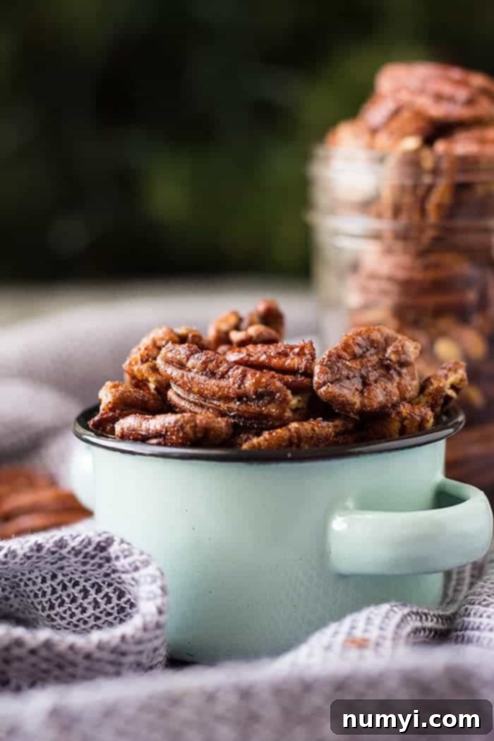 Delicious Sweet and Spicy Pecans served in a bowl, ready for snacking or gifting.