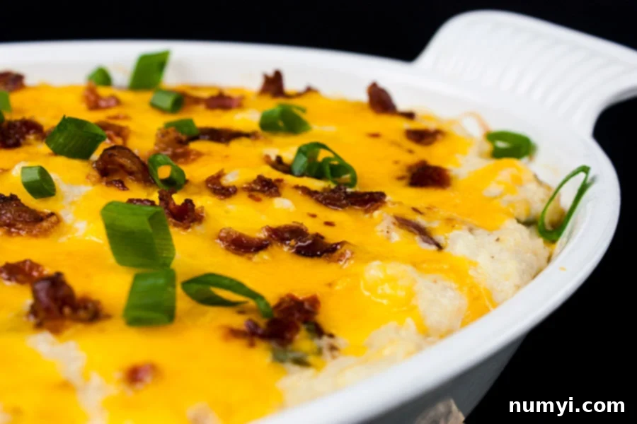 Loaded Cauliflower Mash Casserole – a perfect low-carb alternative for twice-baked potatoes, looking incredibly tasty and full of classic flavors.