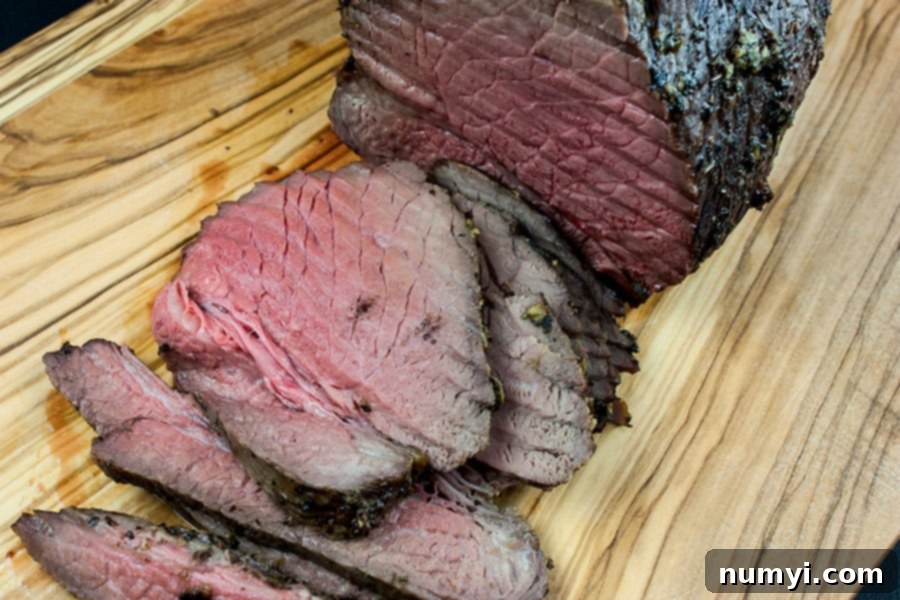 Garlic Herb Beef Top Round Roast - cooked roast sliced
