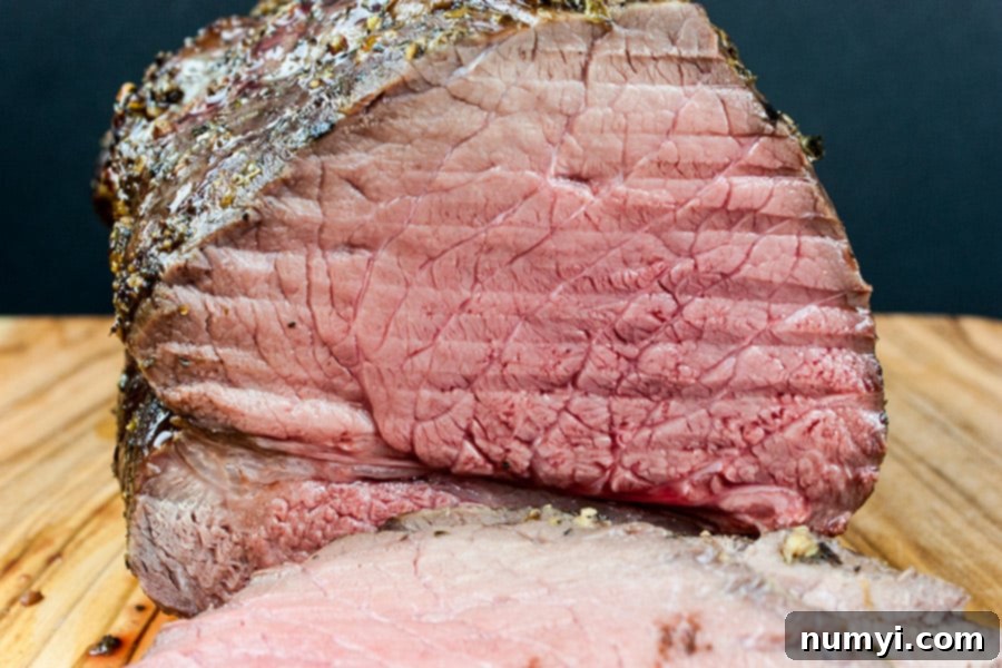 Garlic Herb Beef Top Round Roast - sliced roast
