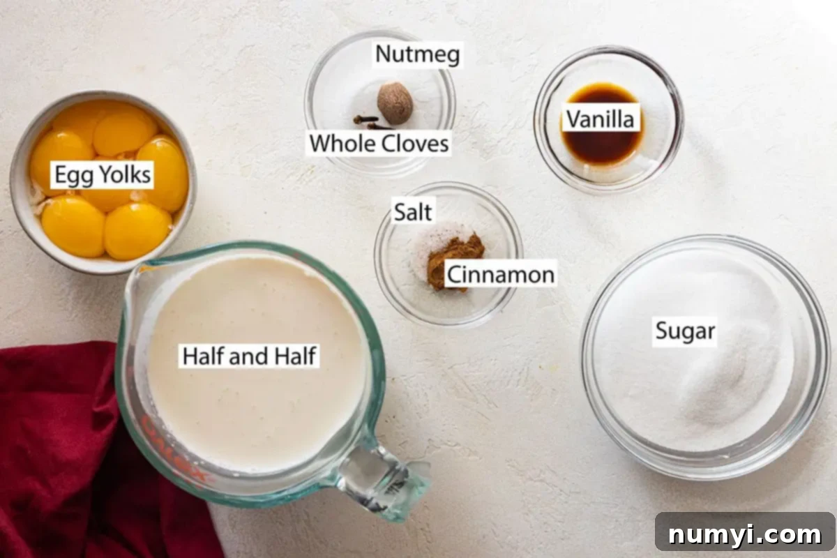 Creamy Homemade Eggnog 3 Ingredients: egg yolks, nutmeg, whole clove, vanilla, salt, cinnamon, sugar, half and half.