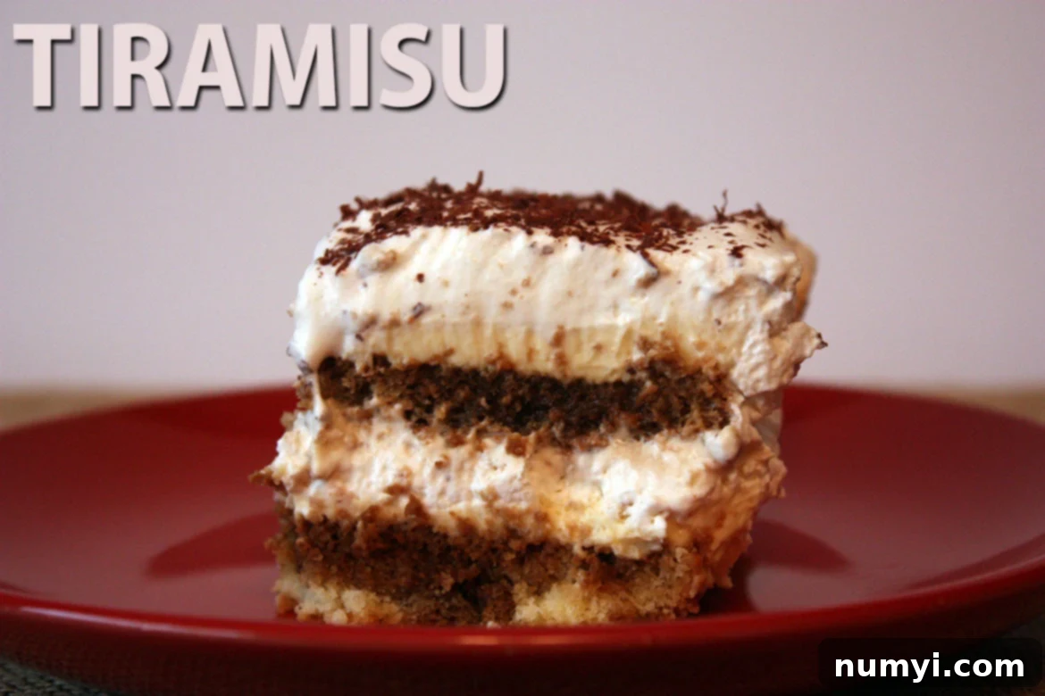 A slice of tiramisu on a red plate.