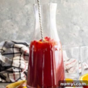 This Pomegranate Apple Cider Sangria is the perfect fall or winter drink! It's even special enough for the holidays! Easy to make non alcoholic too! #drinks #cocktail #Christmascocktail #fallcocktail