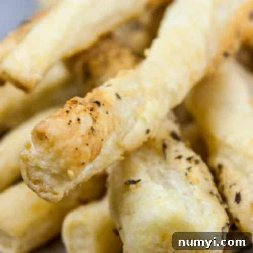 Puff Pastry Parmesan Cheese Straws, a delicious appetizer.