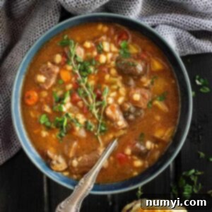 This Instant Pot Beef and Barley Soup is a quicker way to enjoy this hearty and flavorful soup! It's full of tender meat and vegetables and perfectly satisfying! #intsantpotsoup #beefandbarleysoup