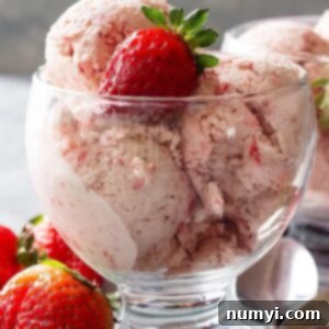 This easy No Churn Strawberry Ice Cream requires no cooking or churning! It's creamy, smooth, and delicious! #nochurnicecream #strawberryicecream