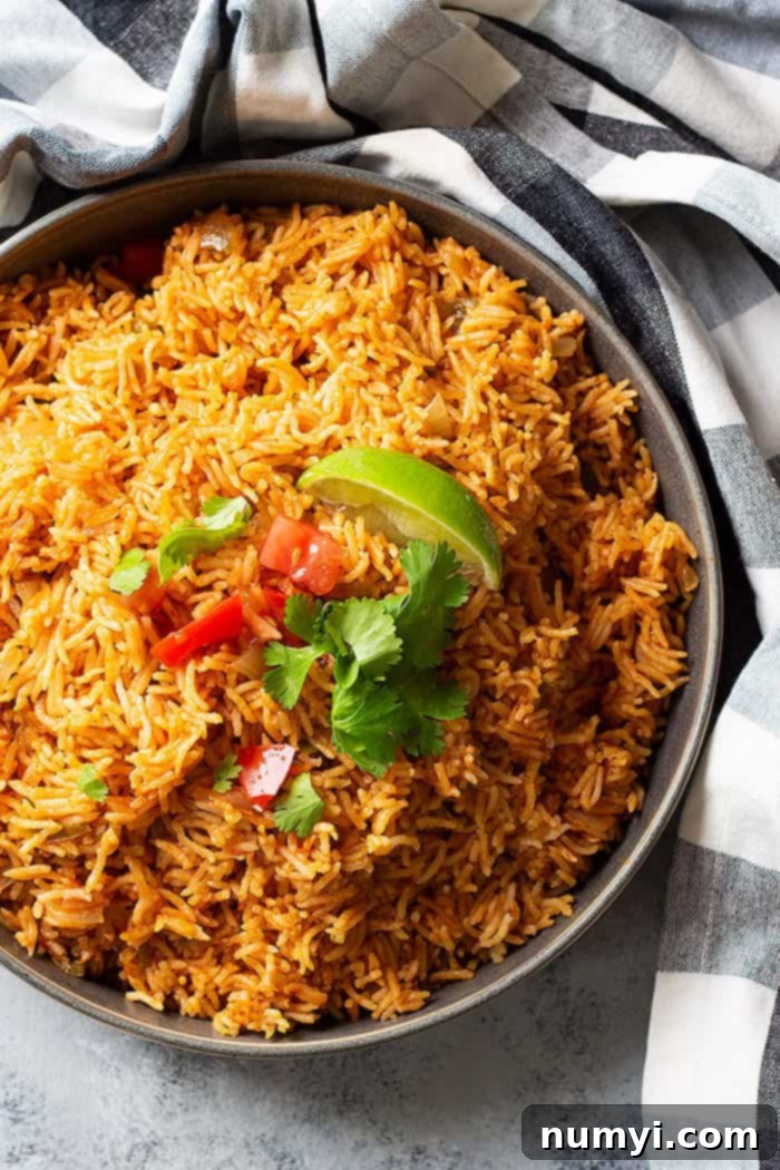 Easy Spanish Rice is the perfect side dish for all you Mexican inspired meals! Instant pot and stove top instructions included! #spanishrice #mexicanrice