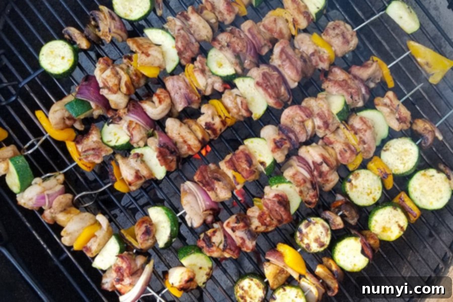 Orange Rosemary Chicken Kebabs on the charcoal grill 