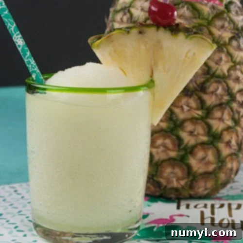 Jamaican Me Crazy Cocktail with a pineapple garnish in a short glass.