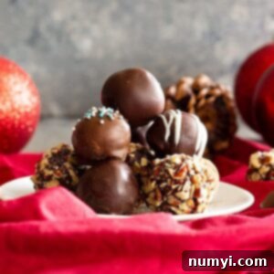 Homemade Chocolate Truffles stacked on top of each other.