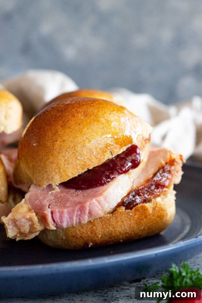A delicious ham sandwich made from a honey wheat roll, highlighting its versatility.