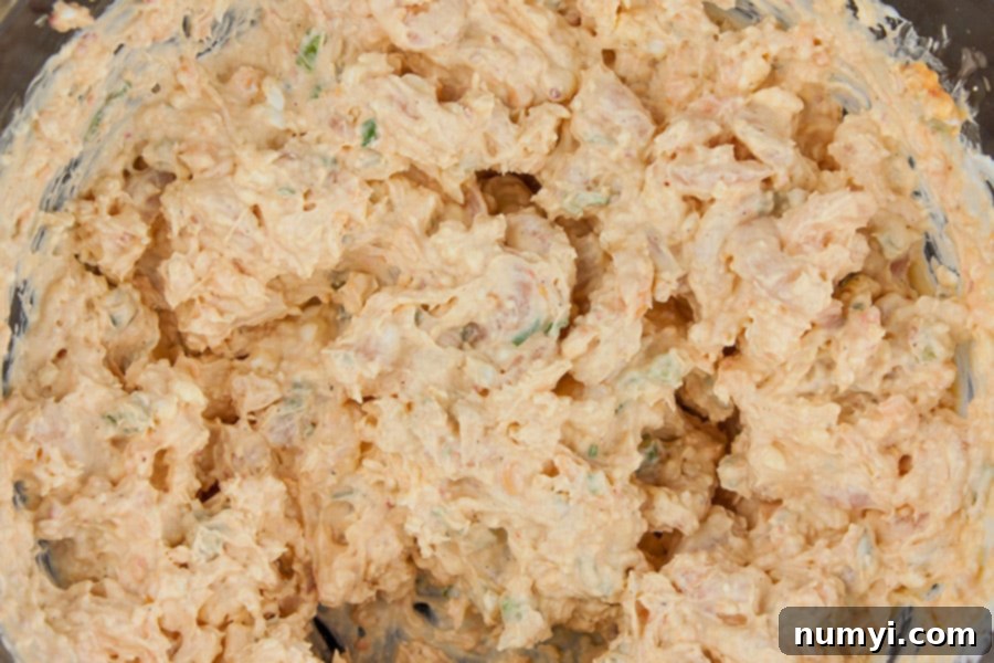 Cold Shrimp Dip ingredients combined together in a mixing bowl