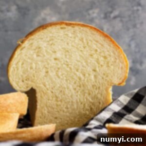 Loaf of bread that has been sliced into.