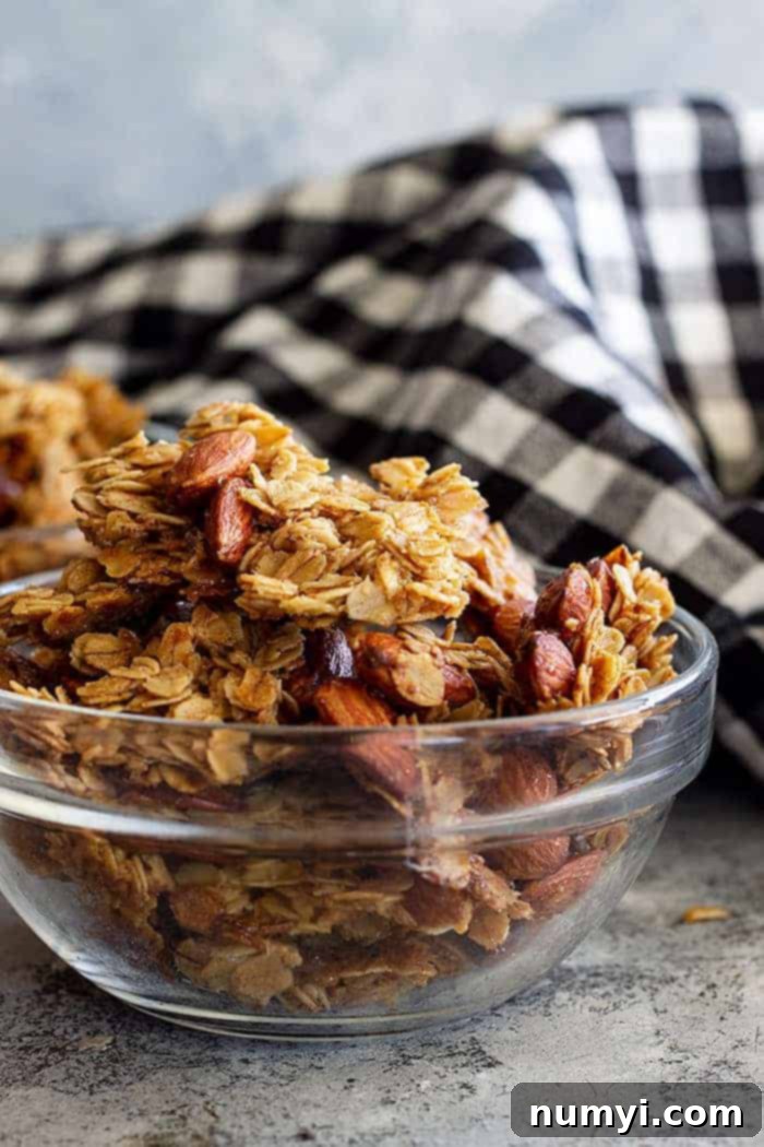 closeup: clusters of almond honey granola recipe in a bowl