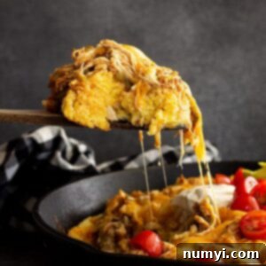Fiesta Chicken Tamale Bake 11 Spoonful of tamale pie being served.