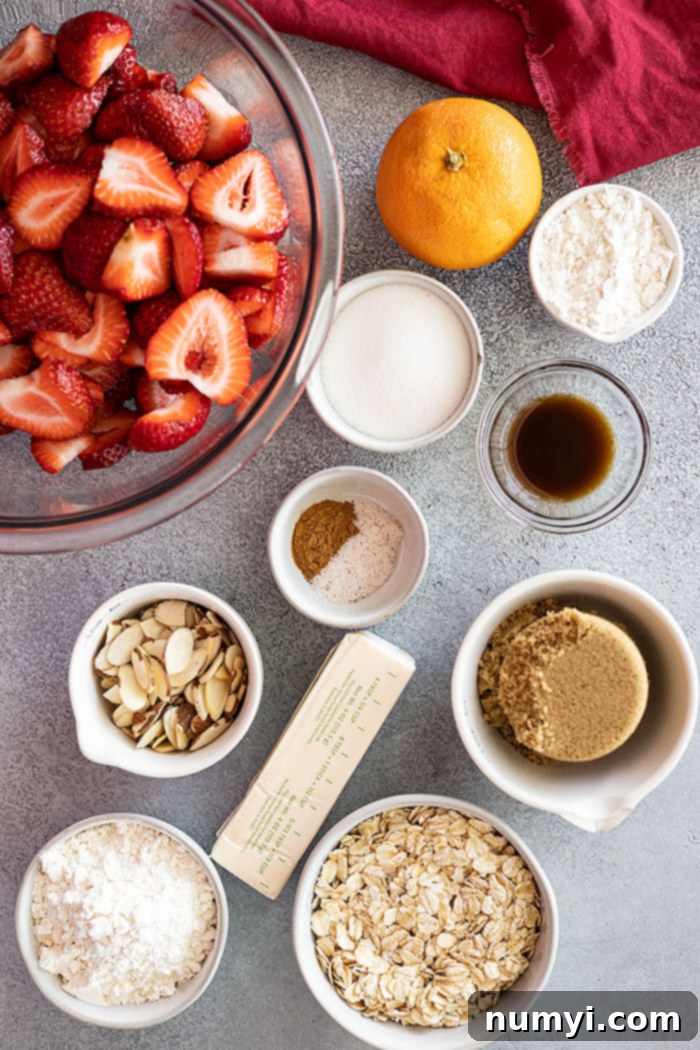 Overhead view of all the ingredients needed to make a strawberry crisp.
