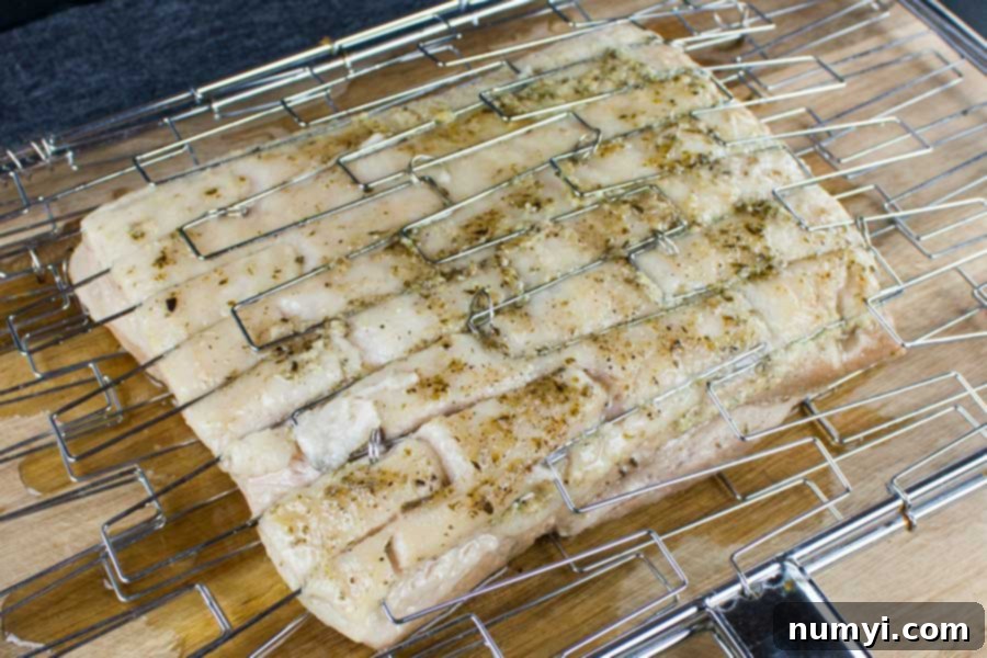 Step up your grill game by serving up some deliciously rendered down smoked pork belly. It's so rich and decadent, everybody will rave!