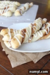 Freshly baked cinnamon twists with icing