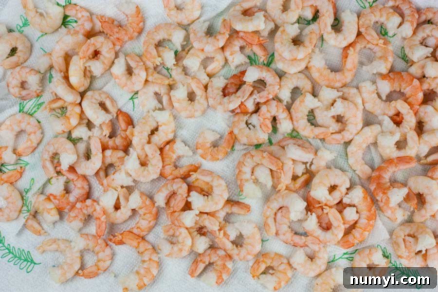 Easy Shrimp Salad 3 Frozen shrimp thawing on paper towels.