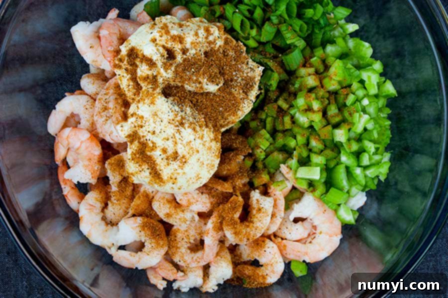 Easy Shrimp Salad 4 Ingredients in a large glass mixing bowl.