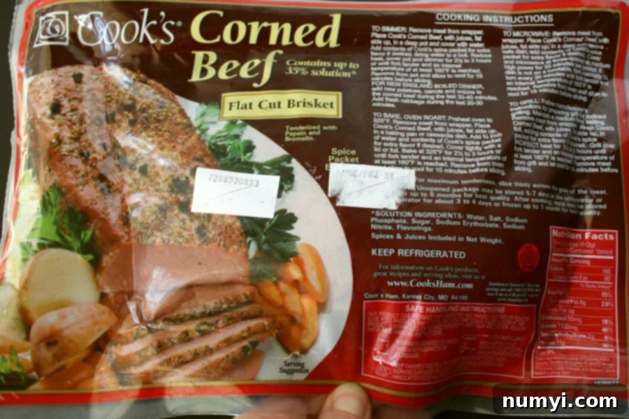 Uncooked prepackaged corned beef with mustard sauce ingredients.