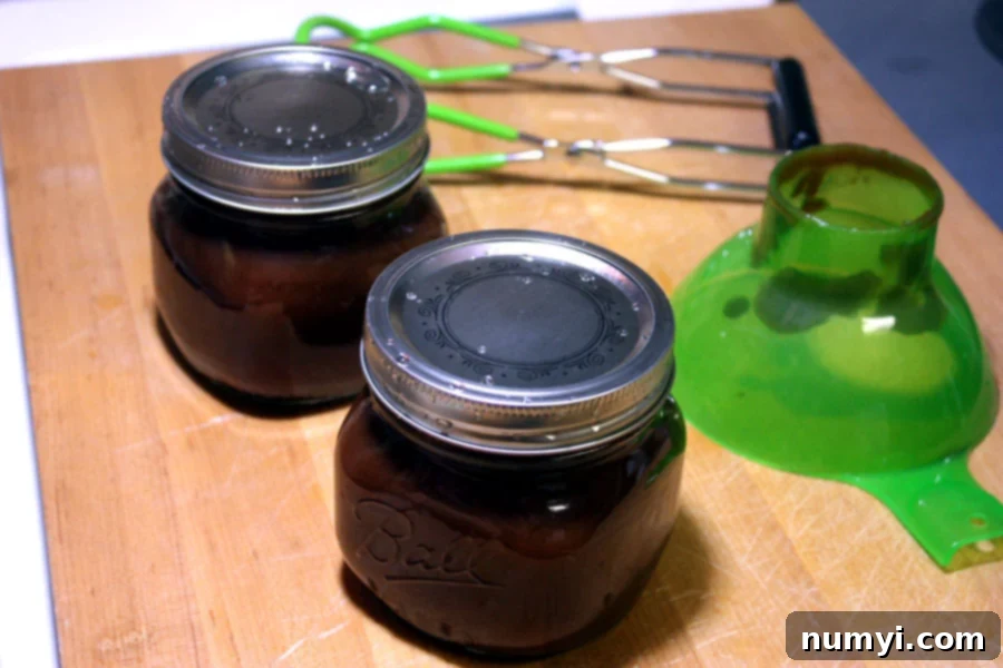 Apple butter canned in mason jars.