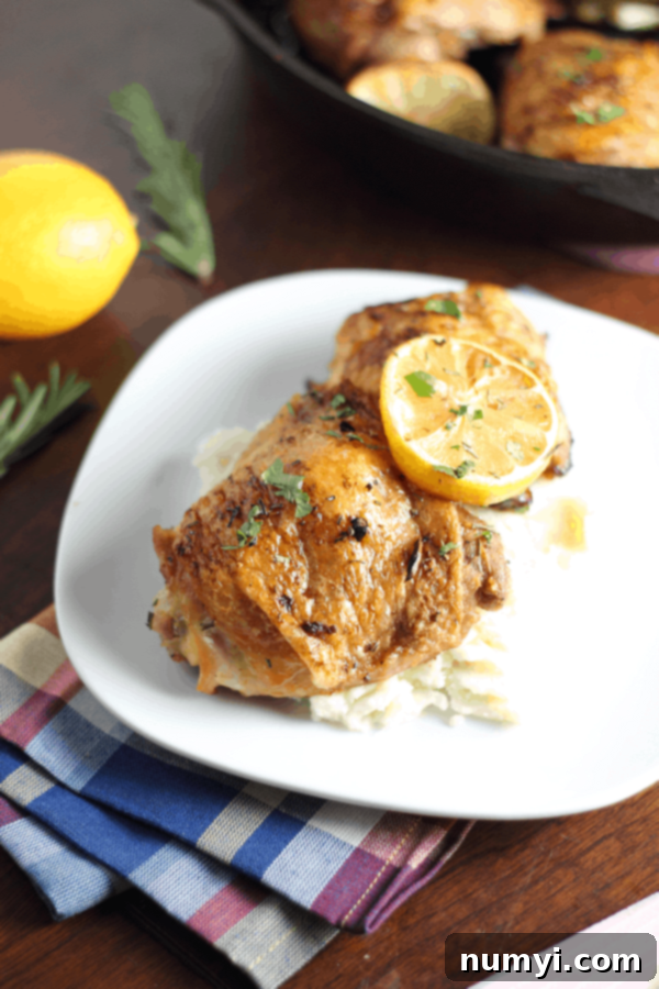 Close-up of baked Lemon Garlic Chicken Thighs