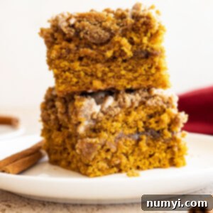 A beautifully baked pumpkin coffee cake, ready to be served.