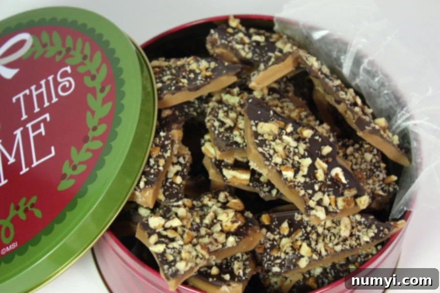 English toffee in a red and green Christmas tin.