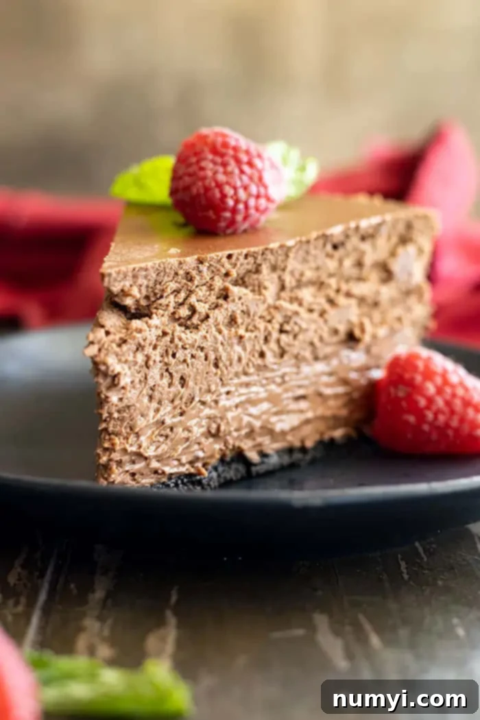 slice of chocolate cheesecake garnished with raspberries