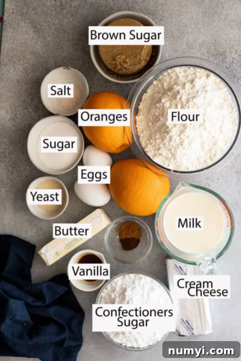 Zesty Orange Cinnamon Rolls 3 Ingredients: flour, sugars, oranges, eggs, salt, yeast, milk, butter, vanilla, cinnamon, clove, cream cheese, confectioners sugar.
