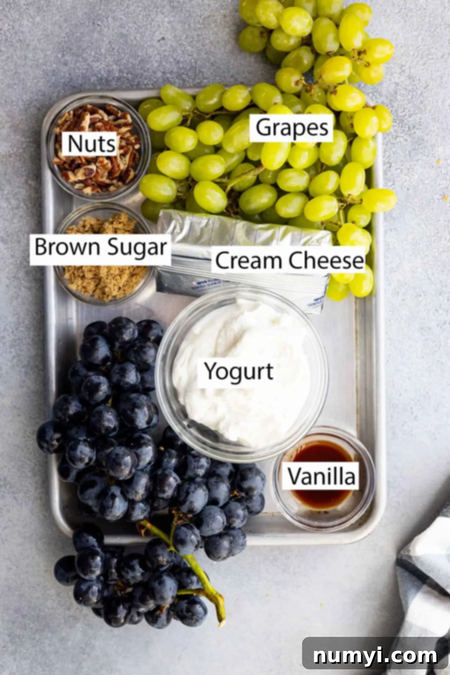 Ingredients: Grapes, cream cheese, yogurt, brown sugar, nuts, and vanilla.