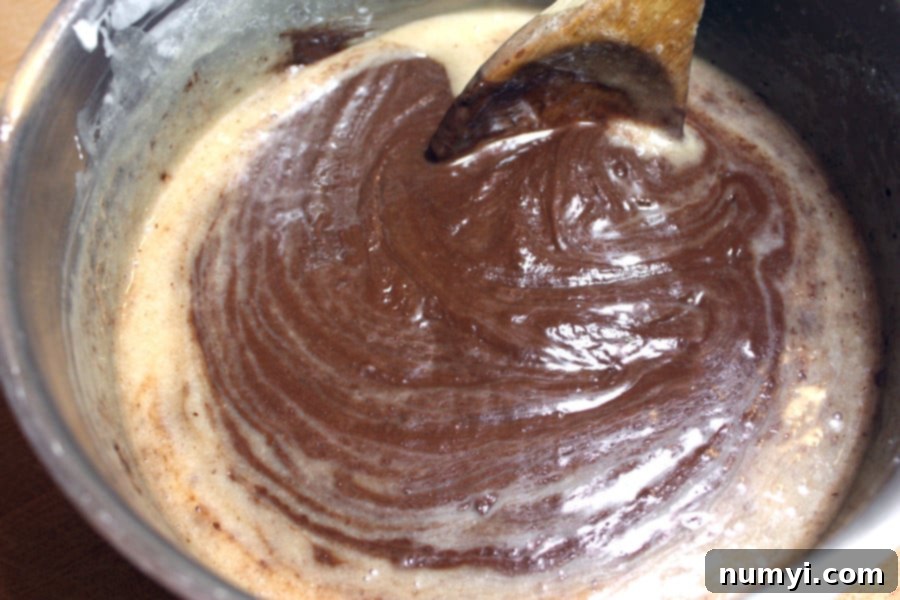 Fudge ingredients cooking in a sauce pan.