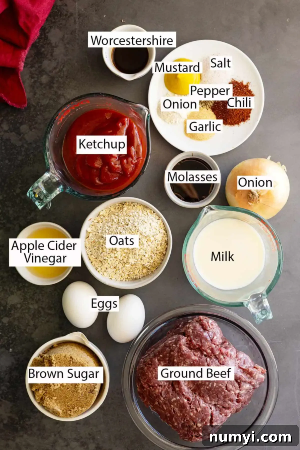 Simple BBQ Meatball Bliss 3 Ingredients laid out for making easy homemade BBQ meatballs, including ground beef, oats, spices, and BBQ sauce components.