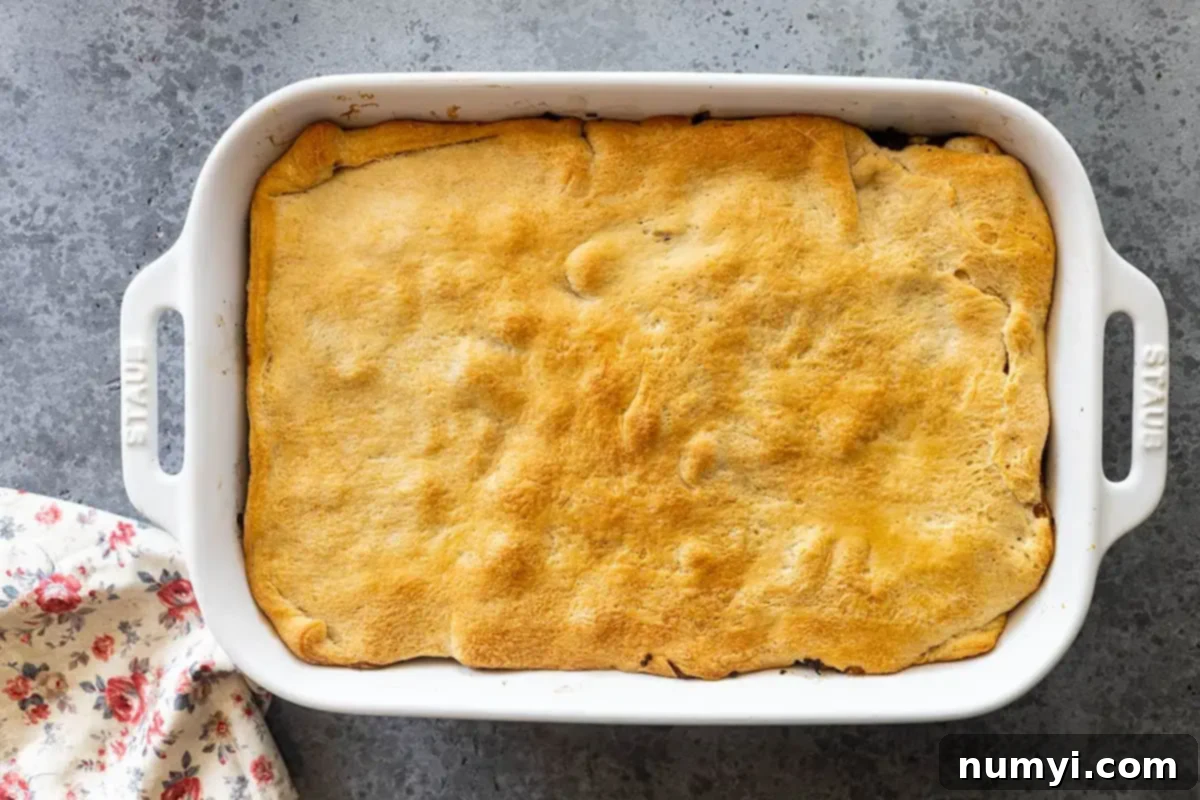 Hearty Runza Casserole 5 Overhead view of casserole straight from the oven showing the golden color of the dough.