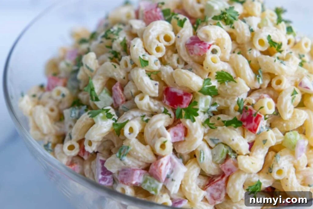Creamy Dream Macaroni Salad 6 macaroni salad in a glass bowl