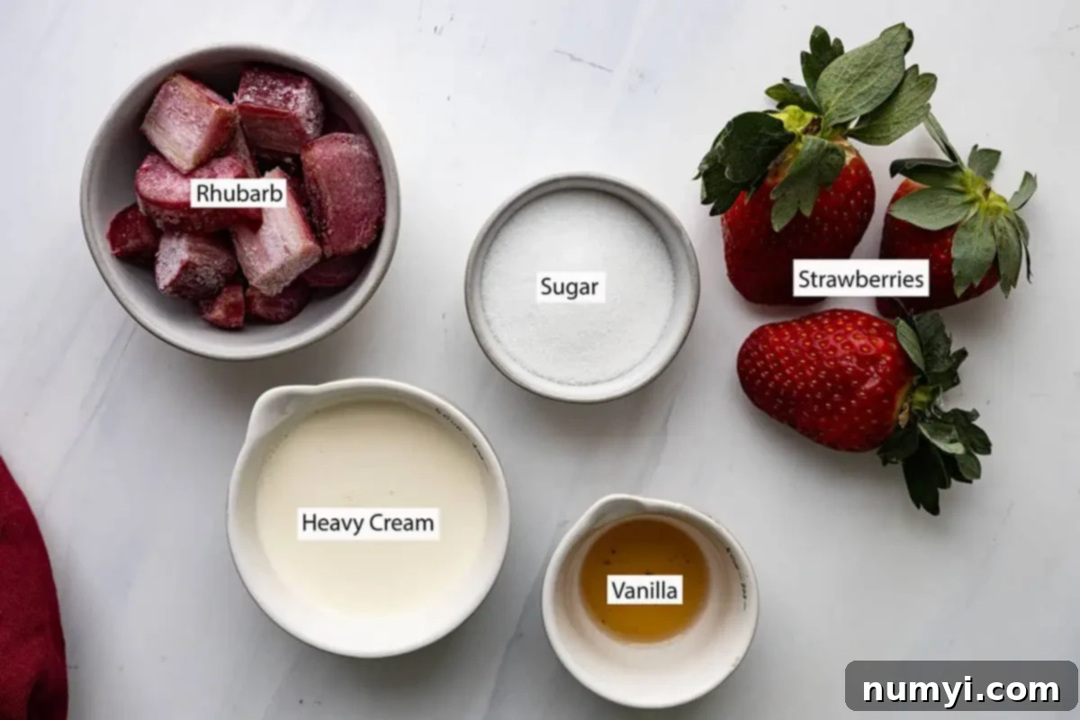 A flat lay photograph showcasing the five simple ingredients: fresh rhubarb stalks, ripe strawberries, granulated sugar, pure vanilla extract, and a carton of heavy cream.