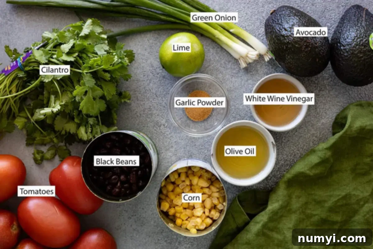 Ingredients: cilantro, lime, green onion, avocado, tomato, black beans, corn, garlic powder, olive oil, white wine vinegar.