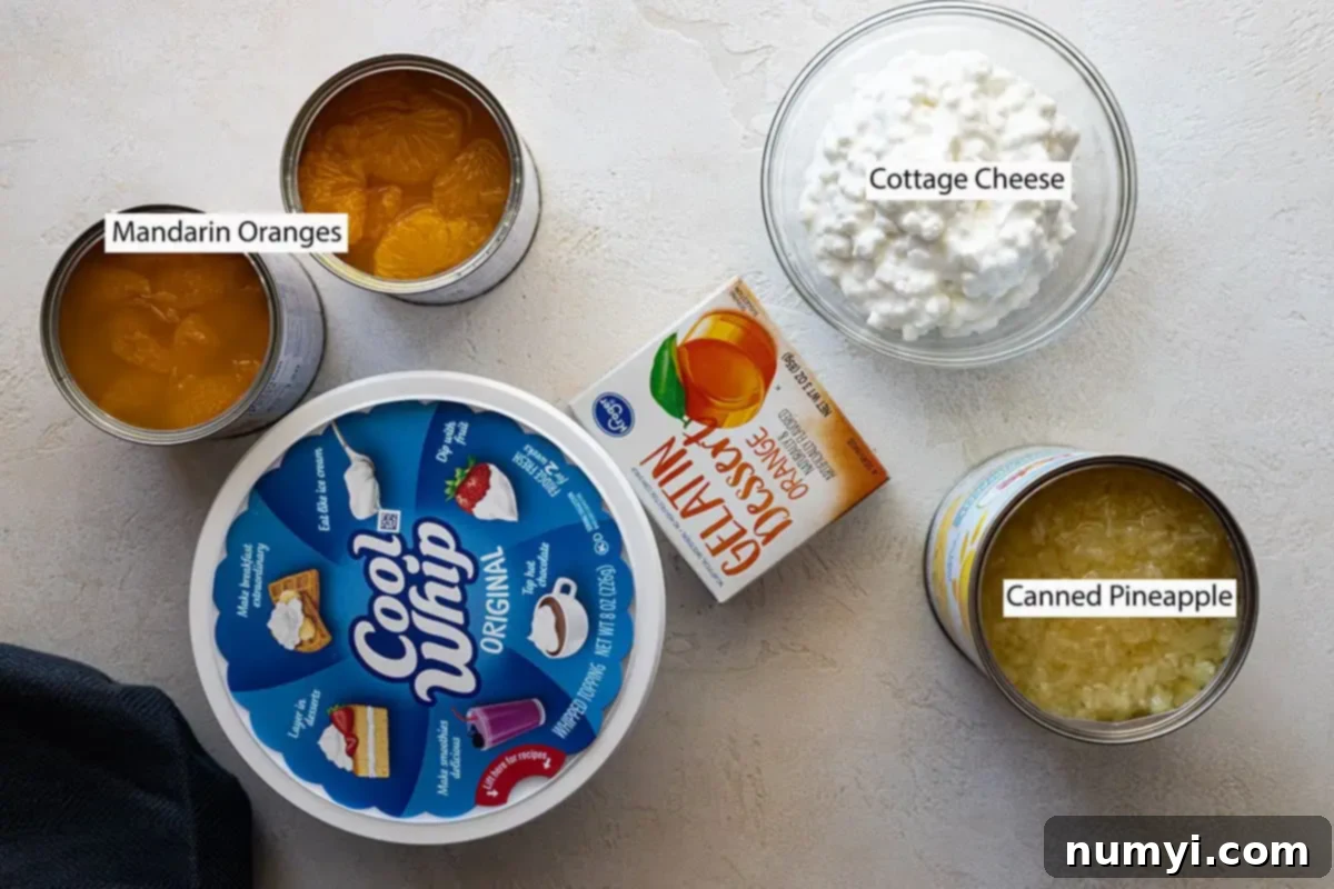 Ingredients: cool whip, mandarin oranges, cottage cheese, orange jello, pineapple.