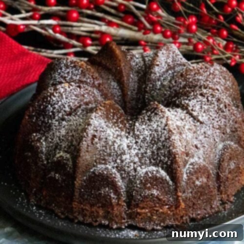 Gramercy tavern gingerbread on black and silver platter.