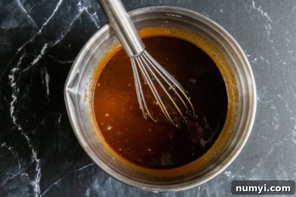 Asian meatball sauce in a mixing bowl