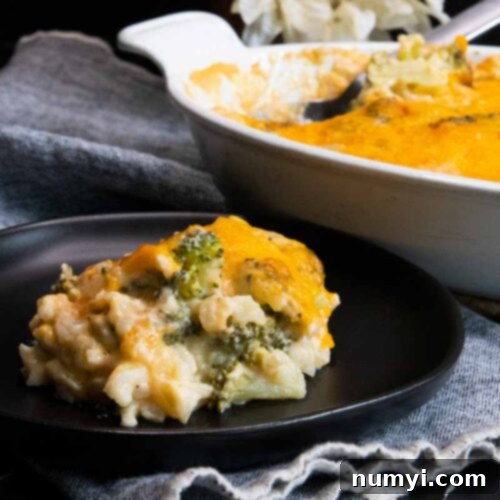 Creamy Broccoli and Cheese Rice Bake 7 Broccoli rice casserole on black plate.