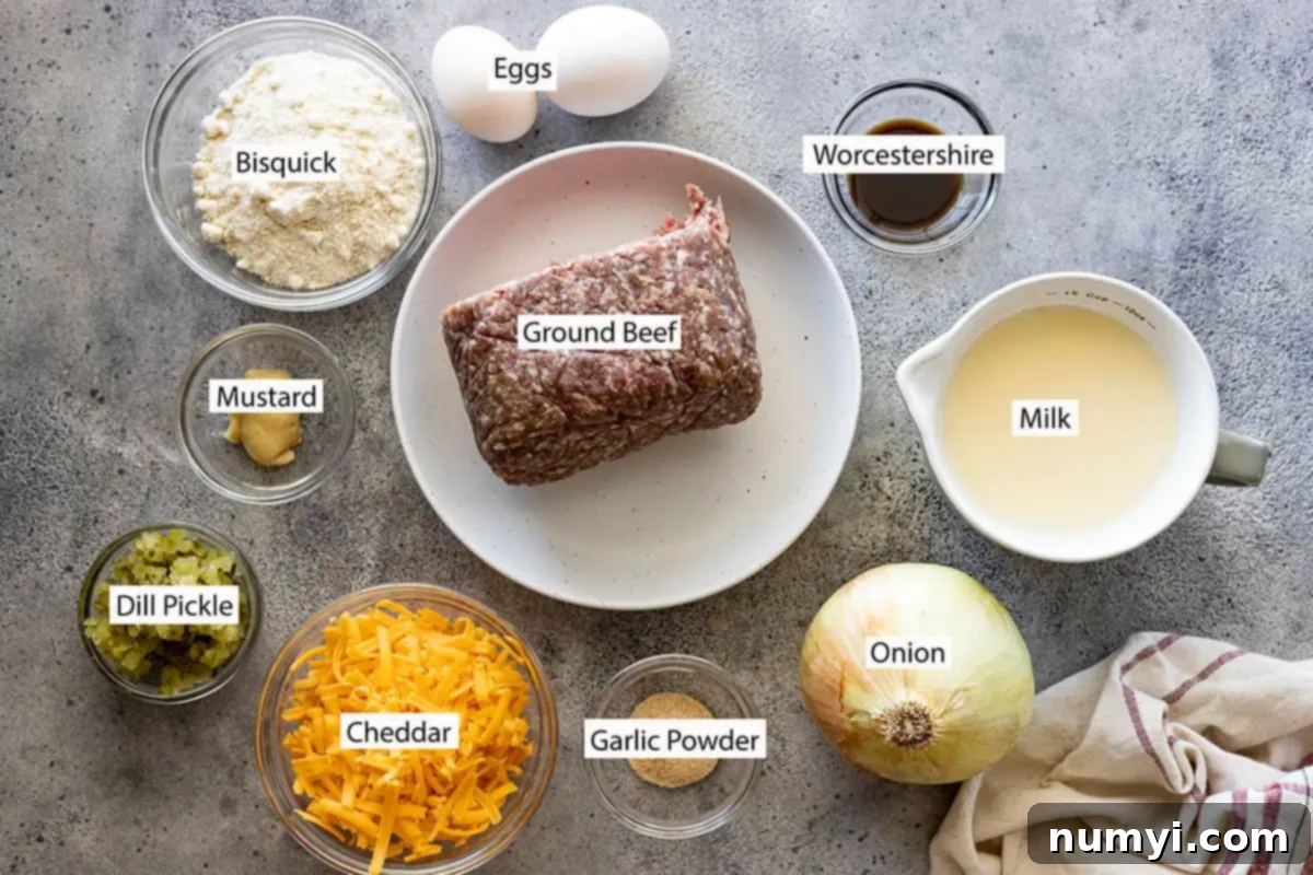 Ingredients: ground beef, baking mix, eggs, worcestershire, milk, onion, garlic powder, cheddar, mustard, and dill pickle. 