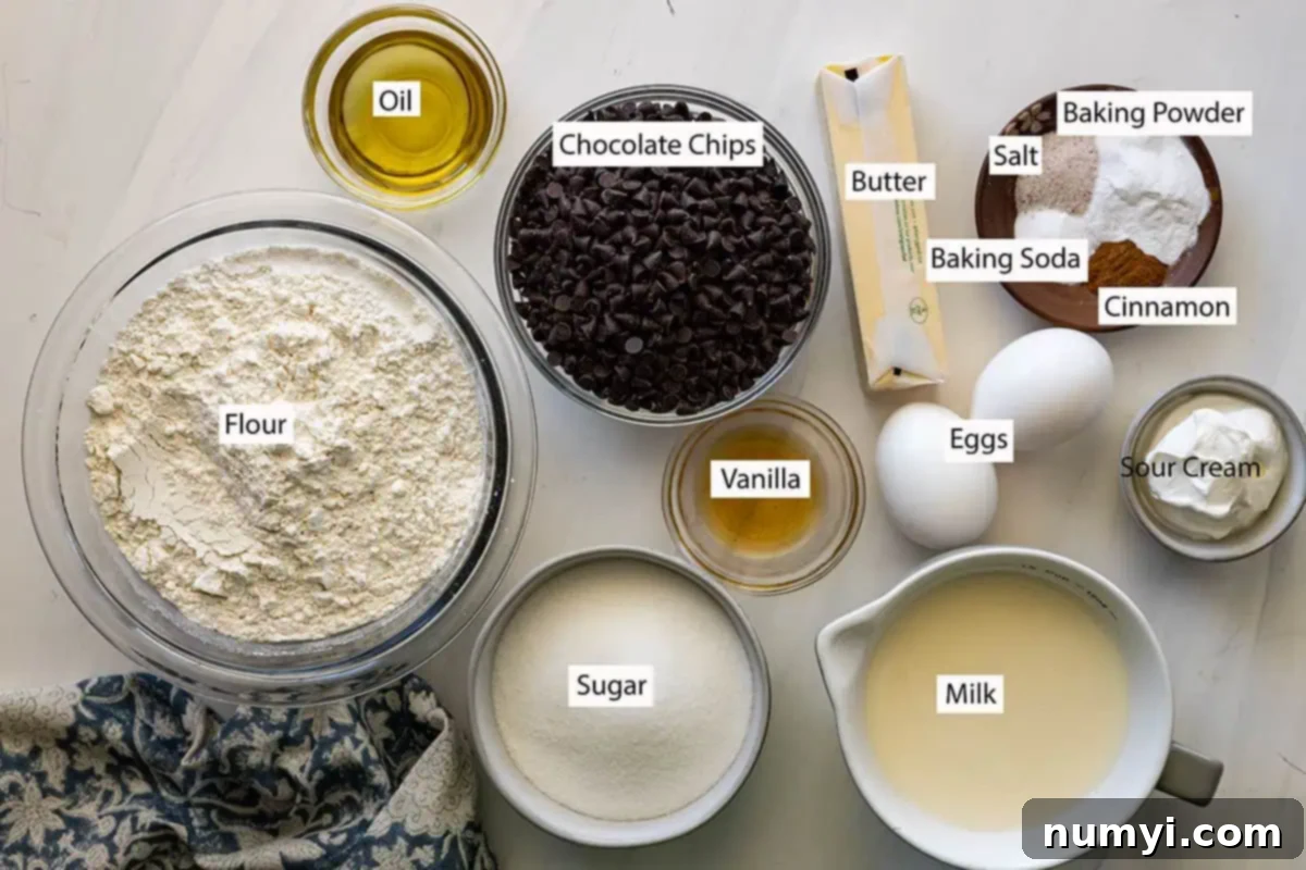 Ingredients: flour, sugar, oil, butter, sour cream, vanilla, eggs, chocolate chips, baking soda, baking powder, salt, and cinnamon.
