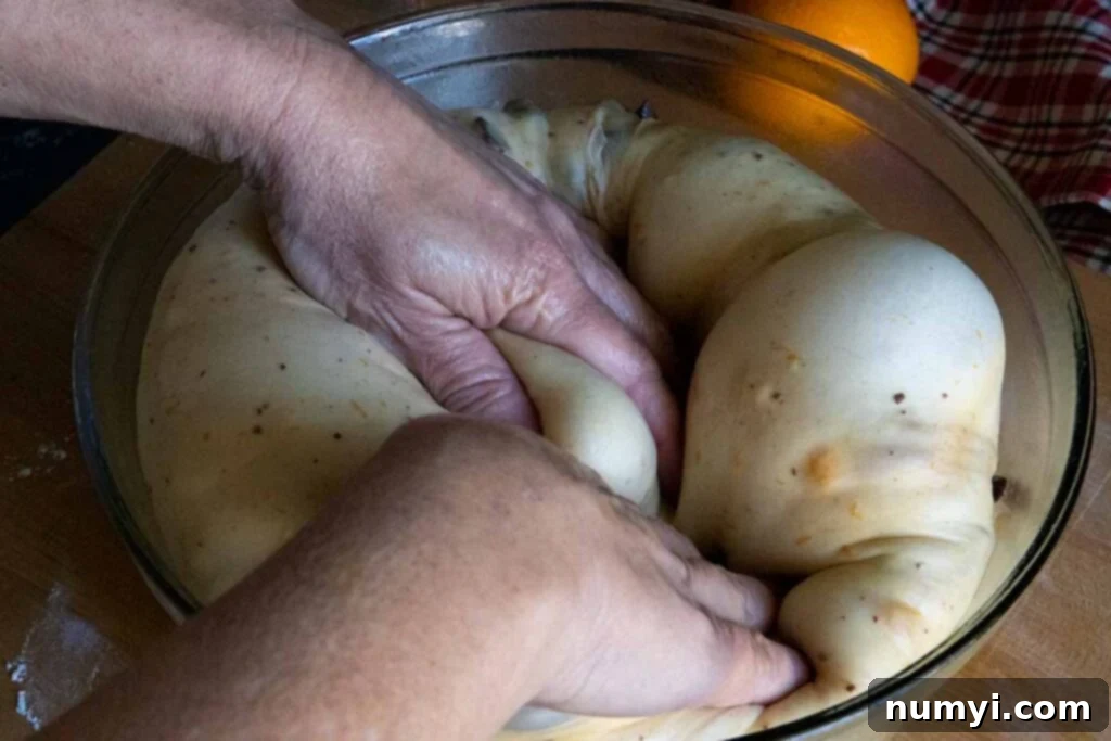 punching the risen dough down