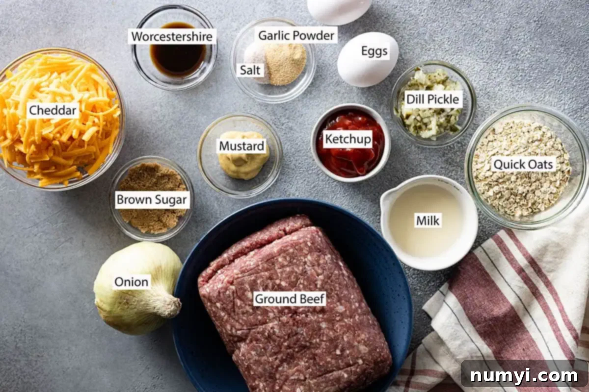 Ingredients: ground beef, onion, milk, quick oats, pickle, ketchup, mustard, brown sugar, cheddar, worcestershire, salt, garlic powder, and eggs. 